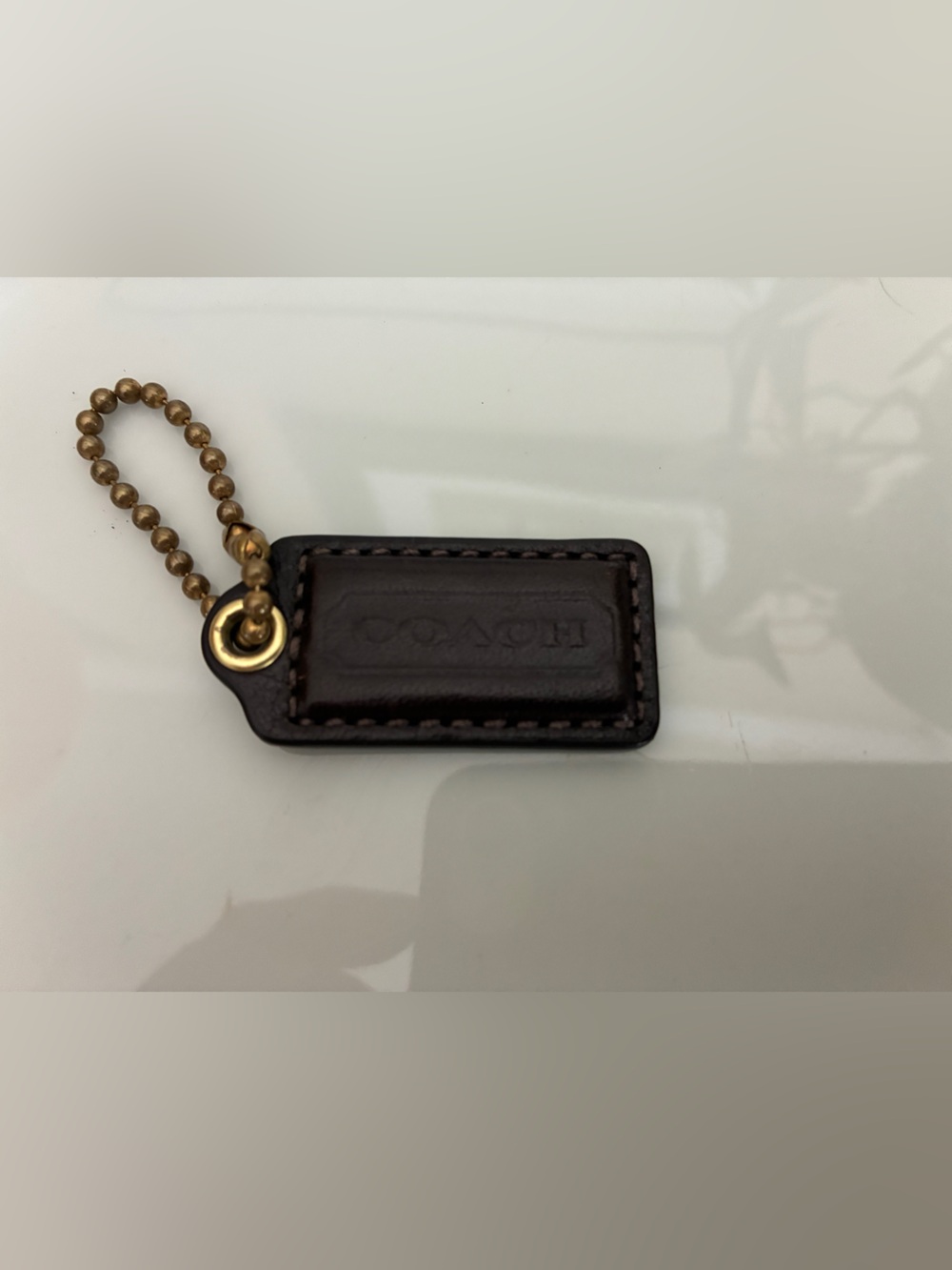 Coach Dark Brown patent Leather Tag with Gold Chain
